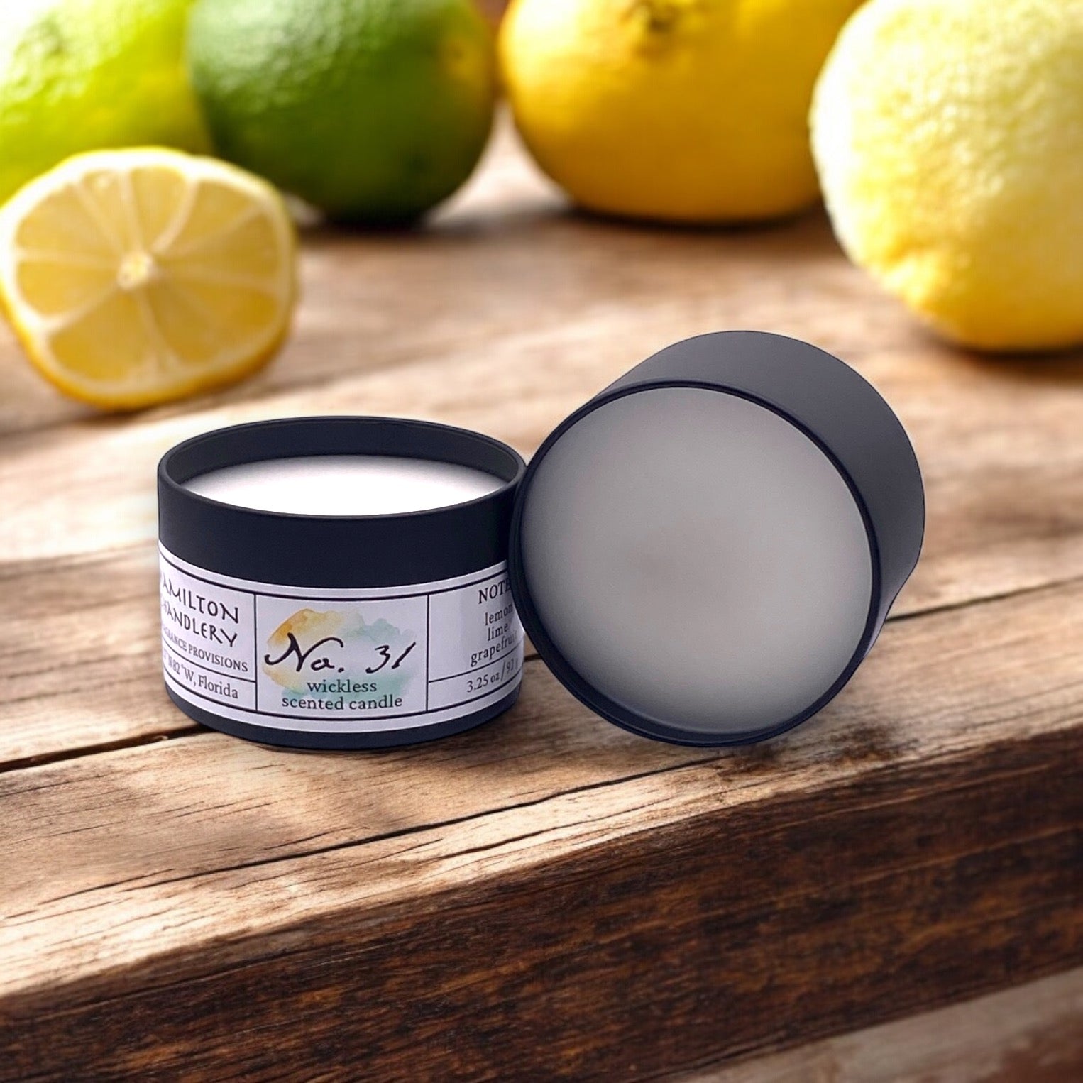 Fragrance No. 31 Wickless Candle Melts on wooden table with background of lemons and limes | Hamilton Chandlery