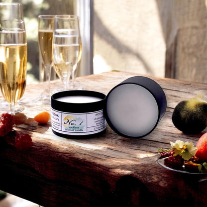 Fragrance No. 1 Wickless Candle Melts on Wooden Table with background of Champagne and Fruit | Hamilton Chandlery