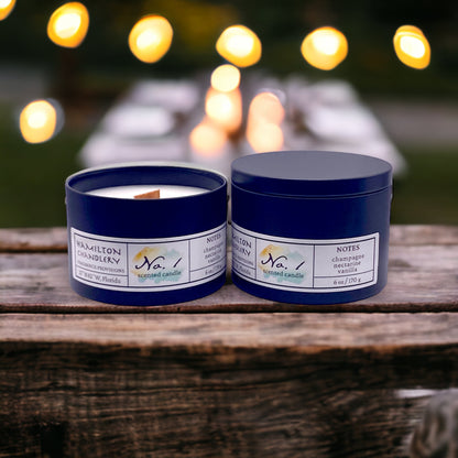 Fragrance No. 1 Travel Tin Candles on Wooden Bench with Twinkle Lights | Hamilton Chandlery