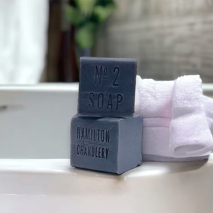 Fragrance No. 2 Sea Salt Soap on Bathtub Edge with White Towels | Hamilton Chandlery