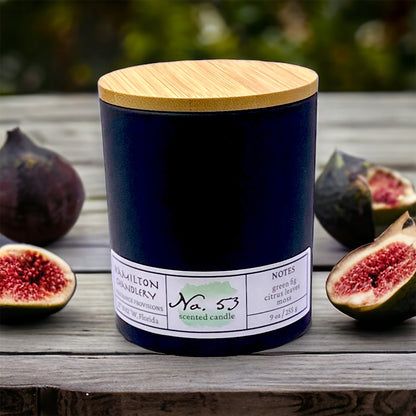 Fragrance No. 53 Blown Glass Candle and Bamboo Lid on Wooden Table with Fresh Cut Figs | Hamilton Chandlery
