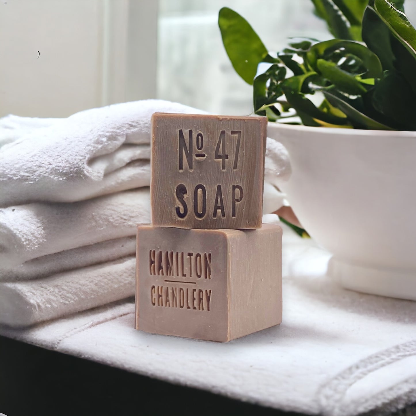 Fragrance No. 47 Sea Salt Soap with White Towels and Plant in Background | Hamilton Chandlery