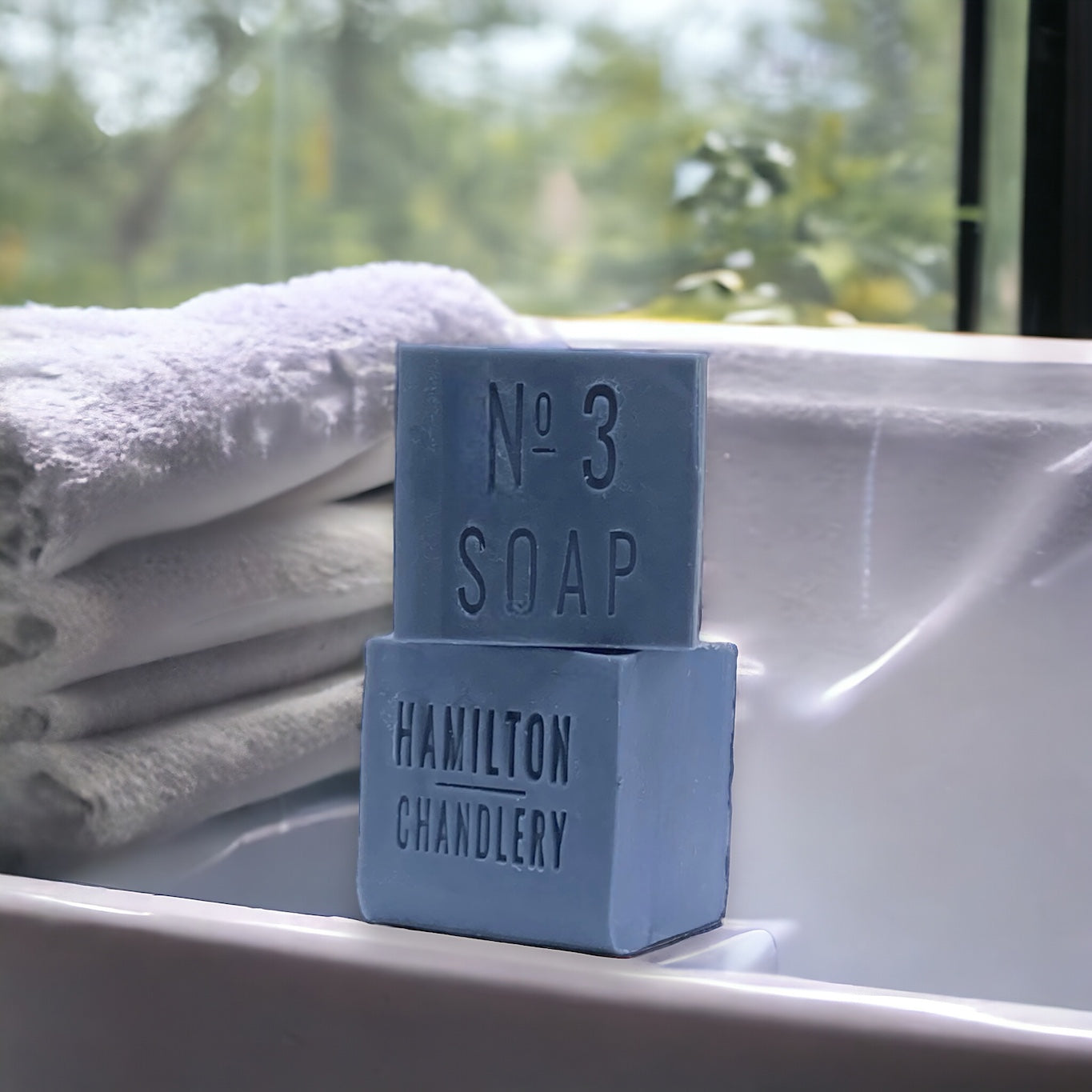 Fragrance No. 3 Sea Salt Soap on Bathtub with Towels in Background | Hamilton Chandlery