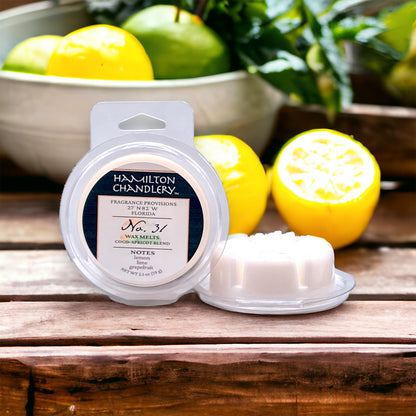 Fragrance No. 31 Wax Melts on Wooden Bench with Lemons and Limes in Background | Hamilton Chandlery