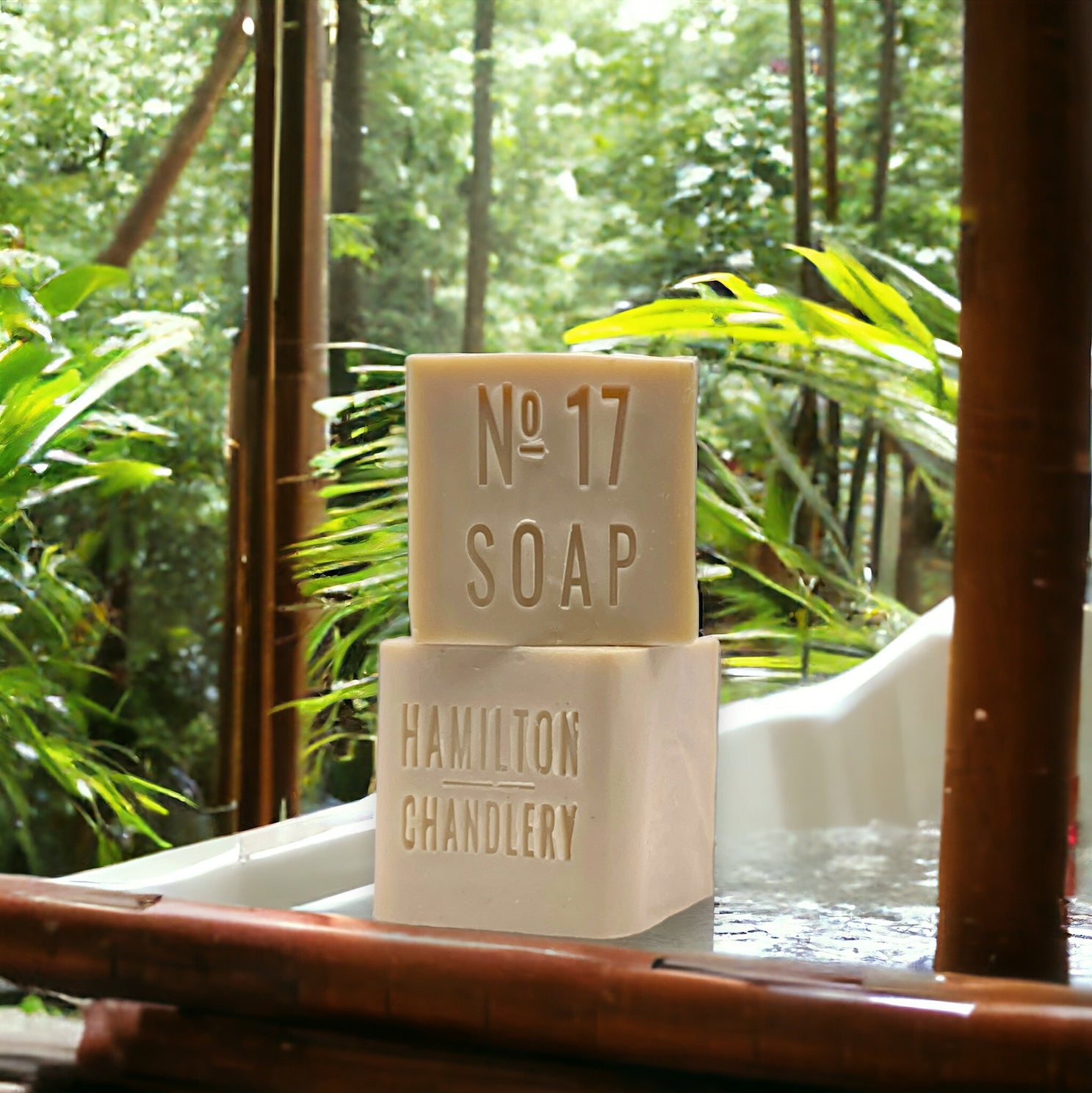 Fragrance No. 17 Sea Salt Soap on Bathtub with Bamboo Trees in Background | Hamilton Chandlery  Edit alt text