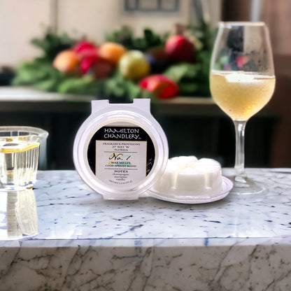 Fragrance No. 1 Wax Melts on Marble Table with Champagne and Fruit | Hamilton Chandlery