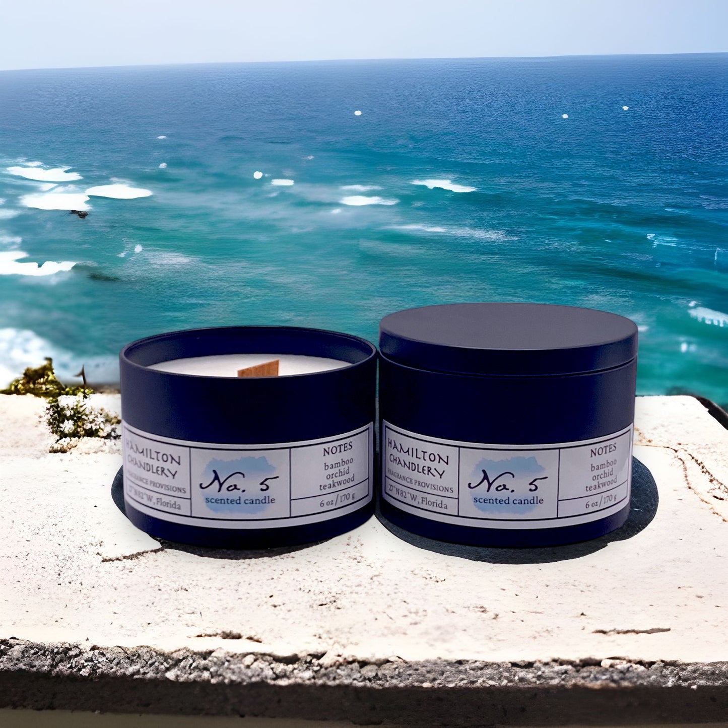 Fragrance No. 5 Travel Tin Candles on Concrete Slate with Ocean in Background | Hamilton Chandlery
